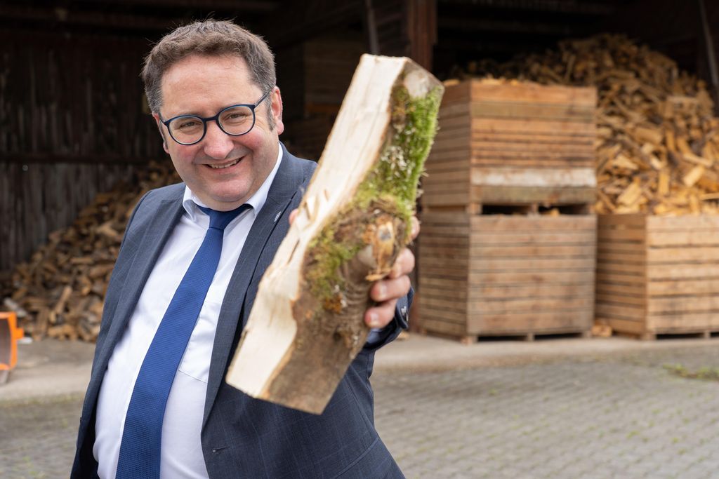 Impressionen der Übergabe des 100. Förderbescheids im Programm BioWärme Bayern.